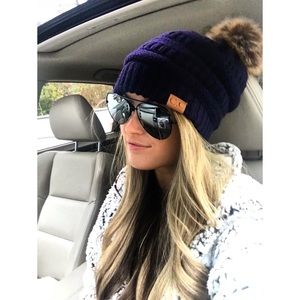 2 C.C beanies with faux fur Pom Pom